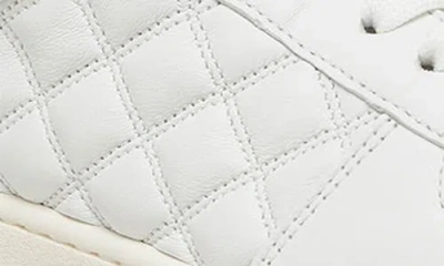Stuart Weitzman Quilted Round Toe Sneakers With Rubber Sole In White