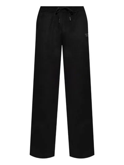 Misbhv Logo-embossed Track Pants In Black