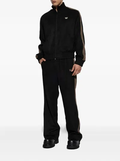 Misbhv Logo-embossed Track Pants In Black
