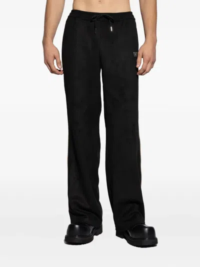 Misbhv Logo-embossed Track Pants In Black