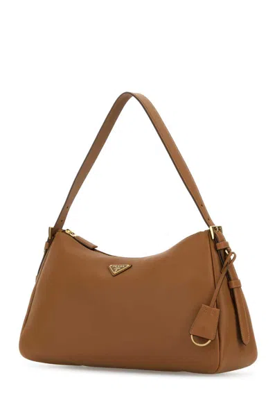 Prada Handbags. In Brown