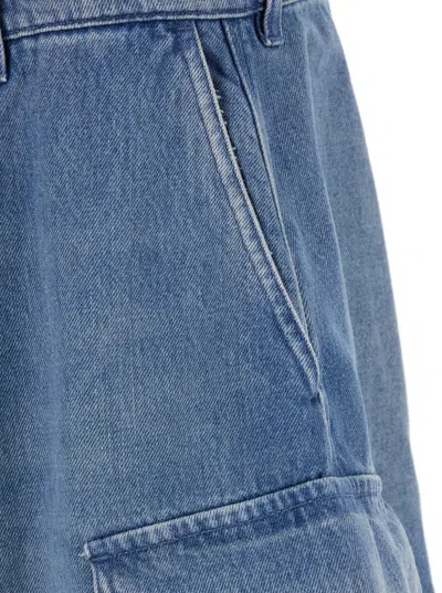 Jw Anderson Light Blue Bermuda Shorts With Cargo Pockets And Logo Patch On The Back In Denim Man In Blue