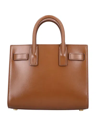 Saint Laurent Nano Sac De Jour Carryall Bag In Brown