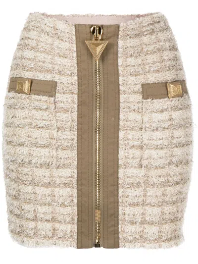 Balmain Button Embellished Front Zip Tweed Mini Skirt In Beige