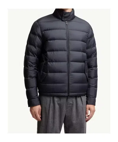 Moncler Quilted Down Jacket With High Collar And Logo Patch In Blue