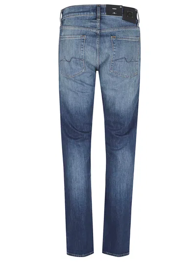 7 For All Mankind Mid-rise Slim-fit Stretch Denim Jeans With Tapered Hem In Blue