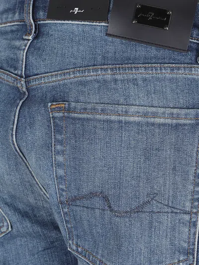 7 For All Mankind Mid-rise Slim-fit Stretch Denim Jeans With Tapered Hem In Blue