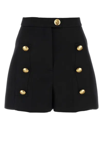 Alexander Mcqueen High-waisted A-line Wool Shorts With Decorative Buttons In Black