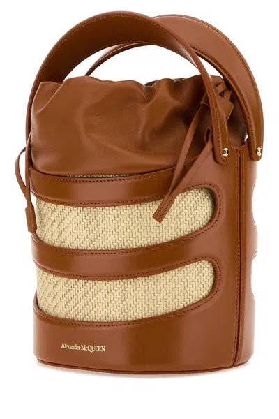 Alexander Mcqueen Two-tone Leather And Raffia The Rise Bucket Bag In Brown