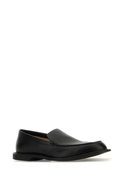 The Row Black Leather Nic Loafers In Black