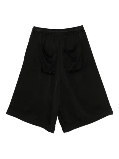 Julius Drawstring Drop-crotch Shorts In Black