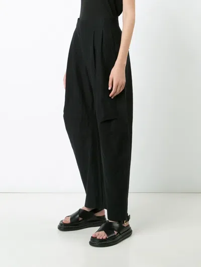 Uma Wang Curved Leg Trousers In Black