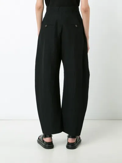 Uma Wang Curved Leg Trousers In Black