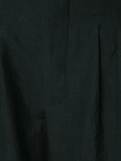 Uma Wang Curved Leg Trousers In Black