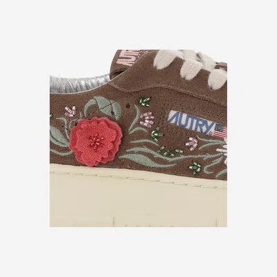 Autry Low-top Sneakers With Floral Embroidery In Rich Brown In Brown