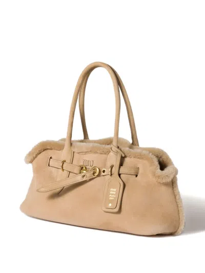Miu Miu Aventure Shearling Tote Bag In Neutral