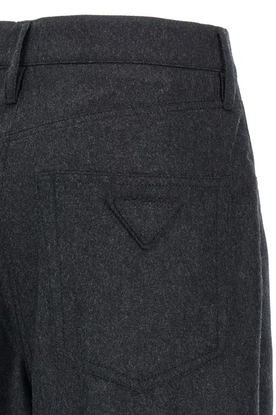 Prada Triangle-patch Pleat-detailed Trousers In Gray