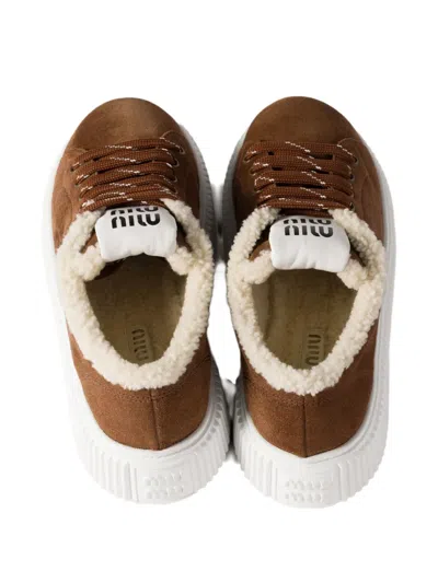 Miu Miu Suede And Shearling Sneakers In Brown