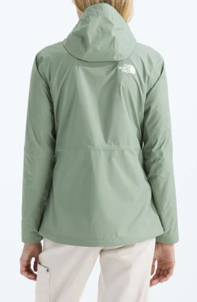 The North Face Women's Alta Vista Hooded Rain Jacket In Green