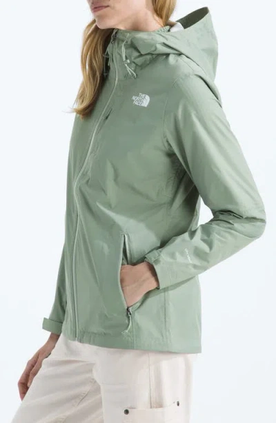 The North Face Women's Alta Vista Hooded Rain Jacket In Green