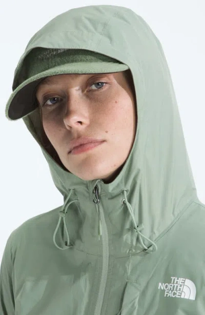 The North Face Women's Alta Vista Hooded Rain Jacket In Green