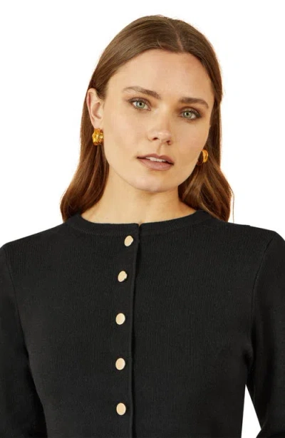 Yumi Chic Peplum Button Up Cardigan In Black