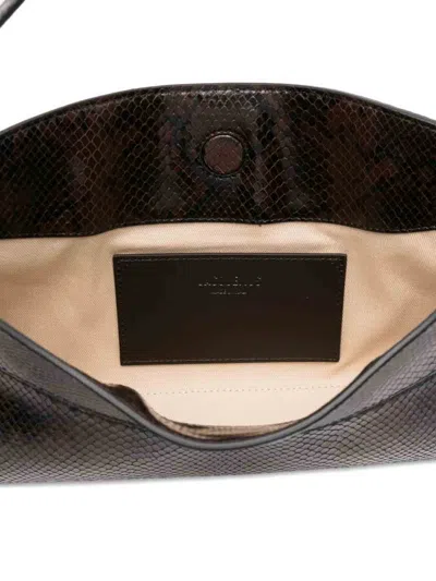 Jacquemus Ovalo Clutch In Brown