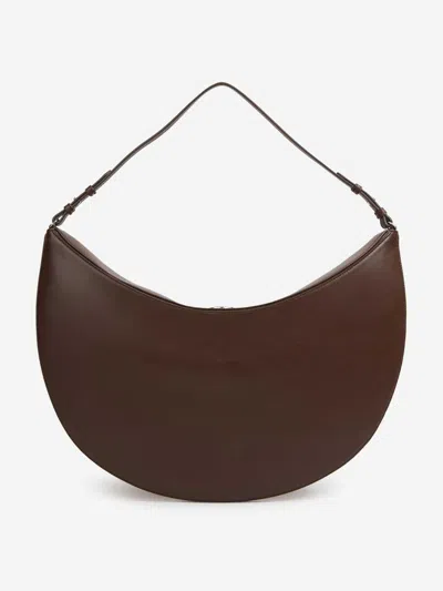 Jacquemus Le Calisso Rond Large Brown Shoulder Bag With Adjustable Strap And Embossed Logo In Leathe In Brown