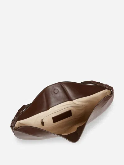 Jacquemus Le Calisso Rond Large Brown Shoulder Bag With Adjustable Strap And Embossed Logo In Leathe In Brown