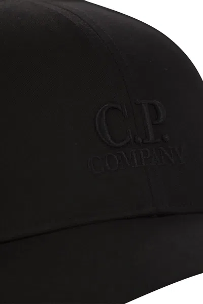 C.p. Company C.p.company Hat With Visor And Embroidered Logo In Black