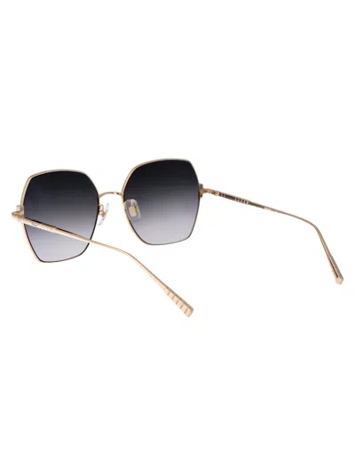 Chopard Gold Titanium Sunglasses In Black