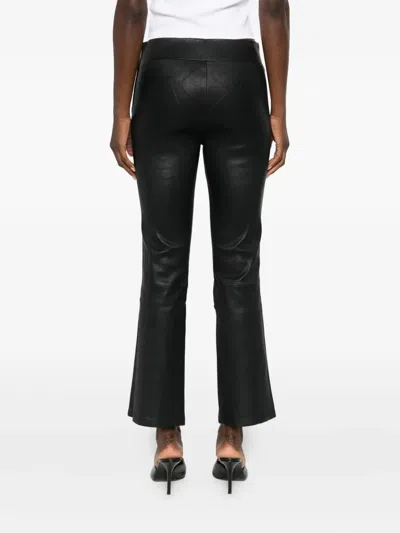 Arma Flared Trousers In Black