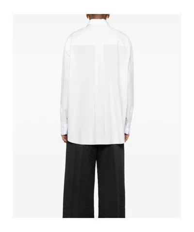 Forte Forte Long Sleeve Top With Curved Hem And Pocket In White