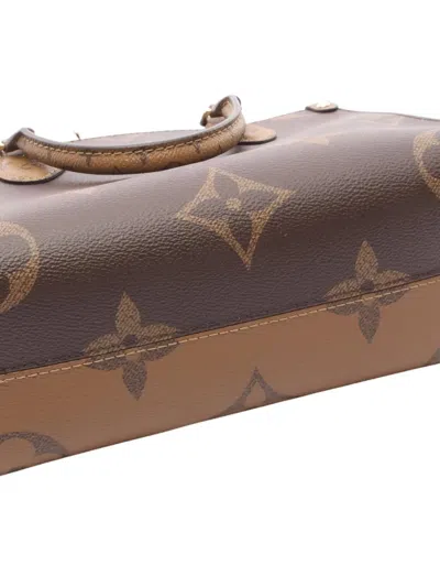 Pre-owned Louis Vuitton 2021-2025 Monogram Reverse Giant Onthego Pm Satchel In Brown