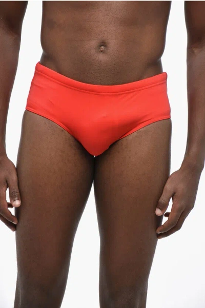Dsquared2 Icon Solid Color Swim Brief With Contrasting Print In Orange