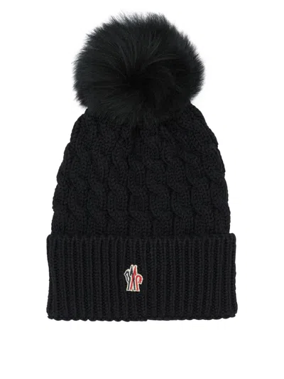 Moncler Wool Hat Featuring Cable Knit And Pom Detail In Black