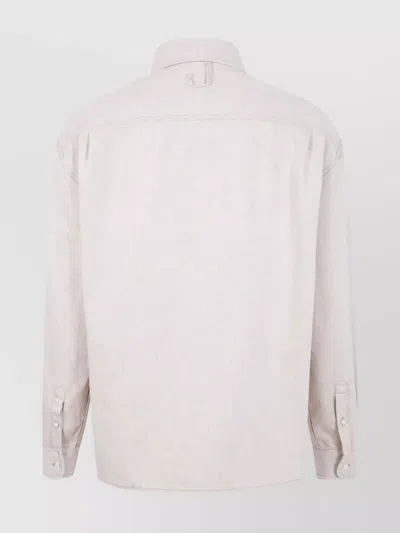Jacquemus Simon Denim Long Sleeve Embroidered Shirt In Pink