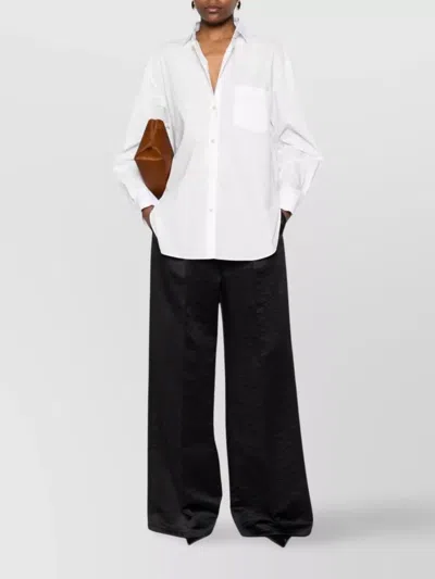 Forte Forte Long Sleeve Top With Curved Hem And Pocket In Yellow