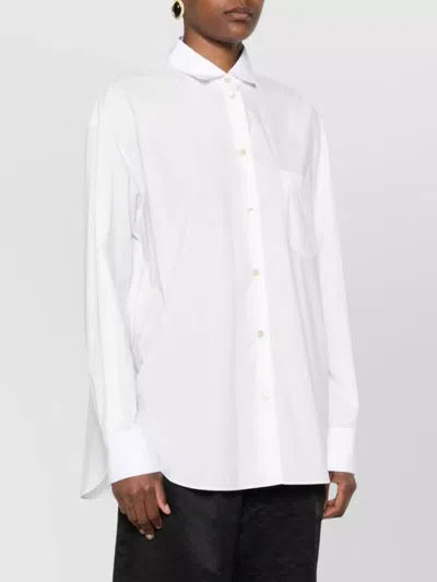 Forte Forte Long Sleeve Top With Curved Hem And Pocket In Yellow