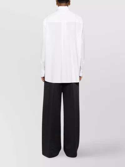 Forte Forte Long Sleeve Top With Curved Hem And Pocket In Yellow