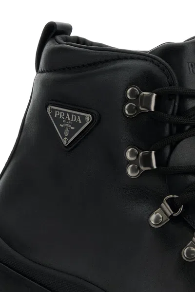Prada Logo Plaque-detailing Boots In Black
