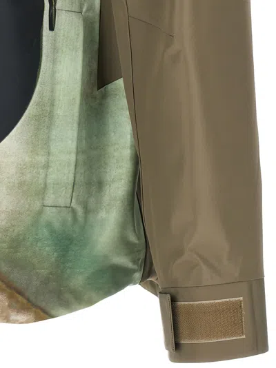 Undercover Water-repellent Nylon Jacket With Futuristic Artwork In Green