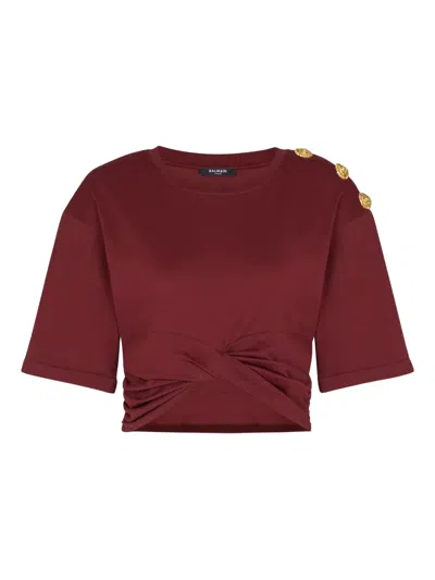 Balmain Twisted Button-embellished Top In Red