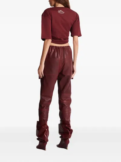 Balmain Twisted Button-embellished Top In Red