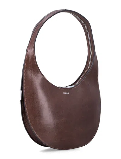 Coperni Small Curved Shoulder Bag Top Handle In Brown