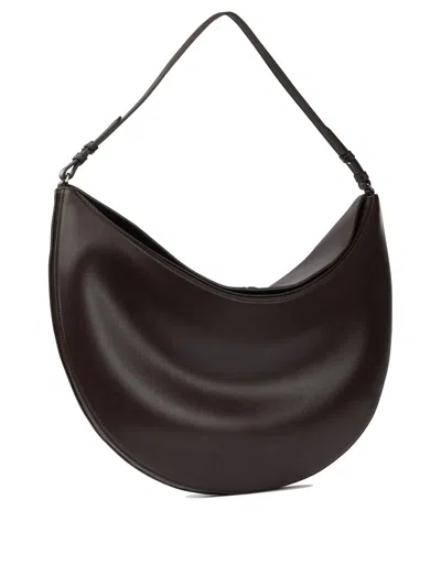 Jacquemus Curved Half-moon Leather Shoulder Bag In Black