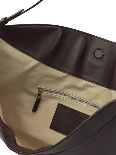 Jacquemus Curved Half-moon Leather Shoulder Bag In Black