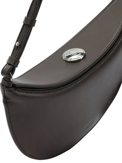 Jacquemus Decorated With A Graphic Pattern And Drawstring Closure. In Brown