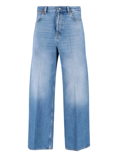 Gucci Blue Jeans With Logo Patch On The Rear And Faded Effect In Denim Woman