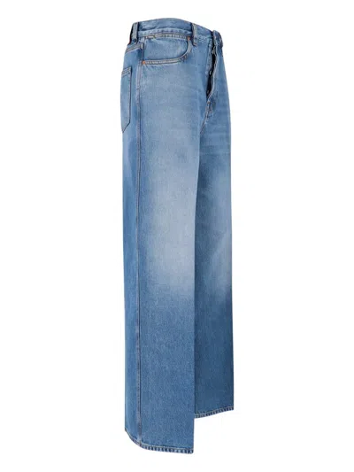 Gucci Blue Jeans With Logo Patch On The Rear And Faded Effect In Denim Woman